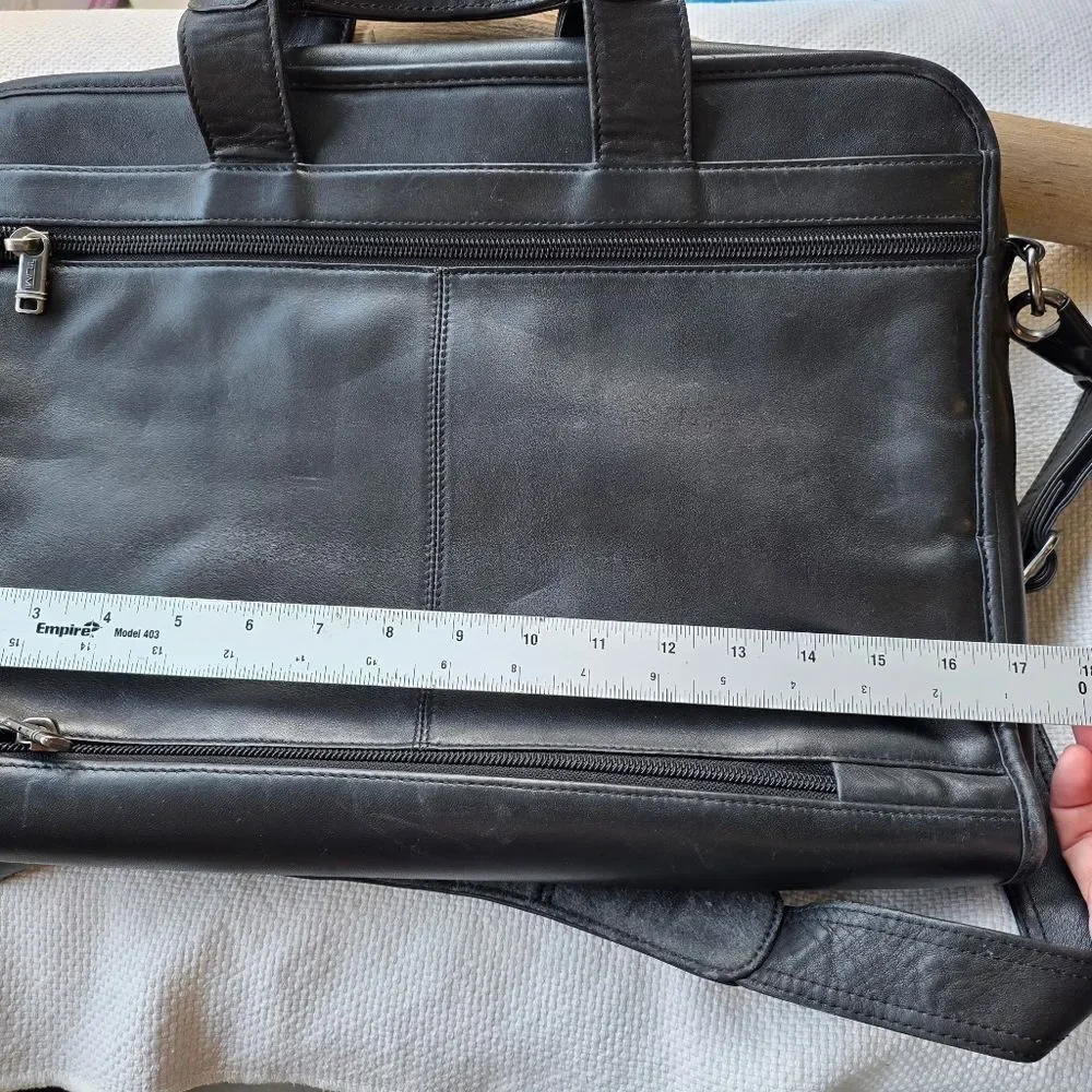 Tumi black leather briefcase